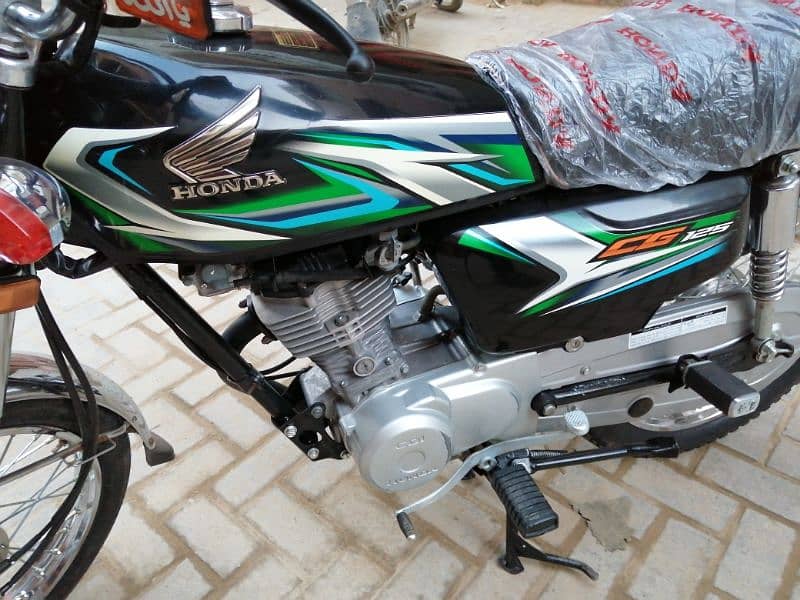 Honda 125 karachi number 23 model 0