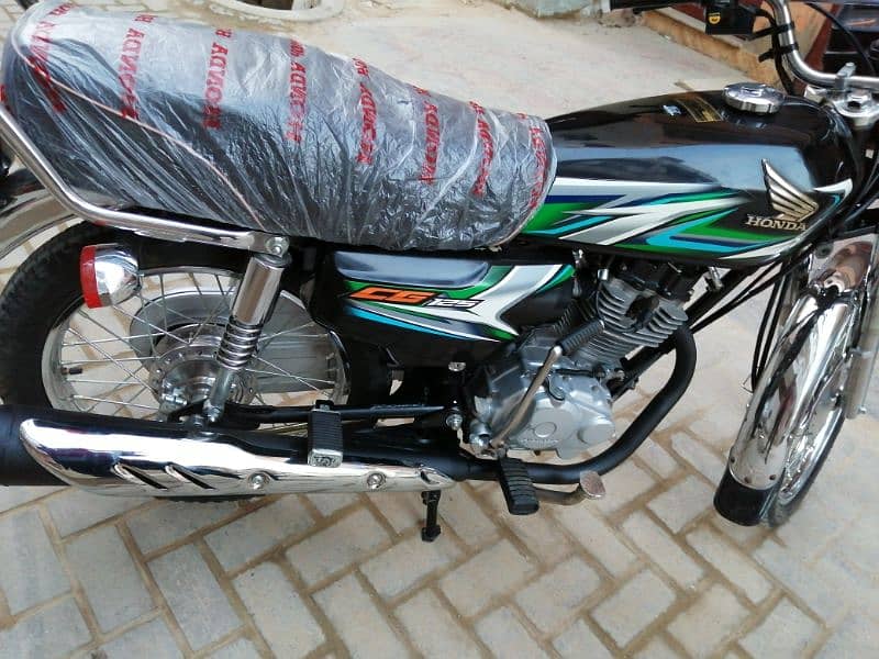 Honda 125 karachi number 23 model 4