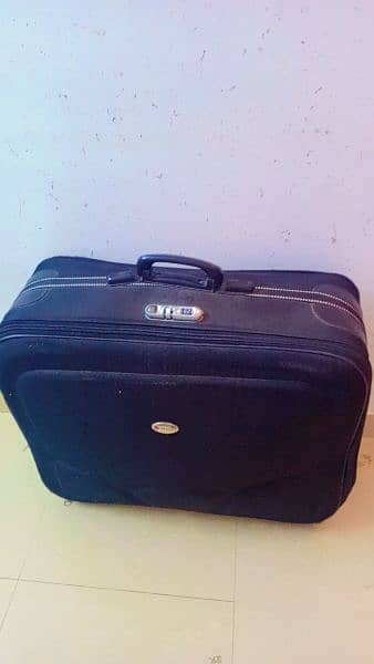 big size luggage in black colour 0