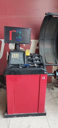 wheel balancing and Alignment Machine