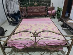 Rod iron bed with mattress for sale