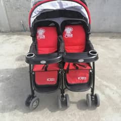 twins pram red colour