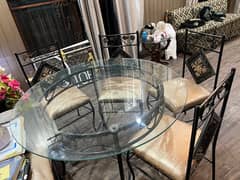 Dining  table and chairs condition new 6 chairs allost new