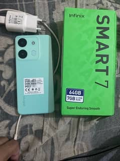 Infinix smart 7 with box charger 8 month warranty remaining