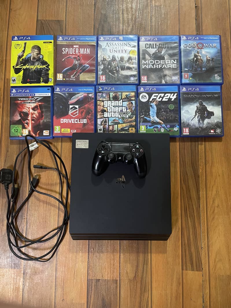 Mid condition ps4 pro woth original controller and any three games 0