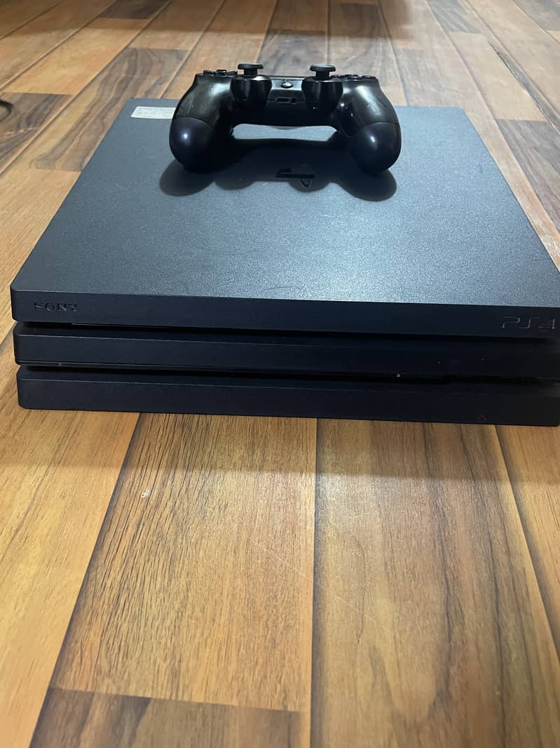 Mid condition ps4 pro woth original controller and any three games 2