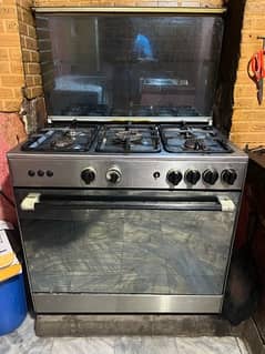 Stove with microwave oven