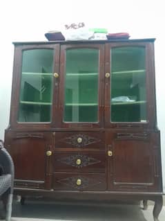 A wooden showcase and a Trunk for sale in good quality