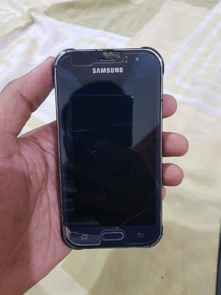 Samsung Galaxy J1 Ace (dead) but can be used for parts. 5