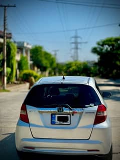 Honda Fit 2011 hybrid urgent sale price finl isb reg non accidental