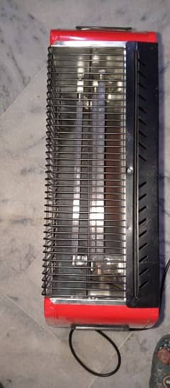 2 heater for sell safeed 1500 or red colour Irani 3 rad wala 7000