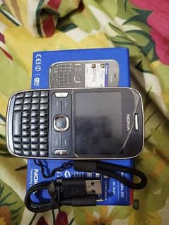 Nokia Asha 302 with box