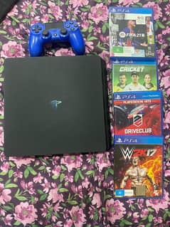 Playstation 4 slim 1TB with 4 games and 1 controller