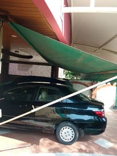 Retractable car parking shade