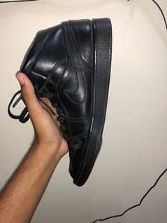 AIR JORDAN 1 MID TRIPLE BLACK SNEAKERS