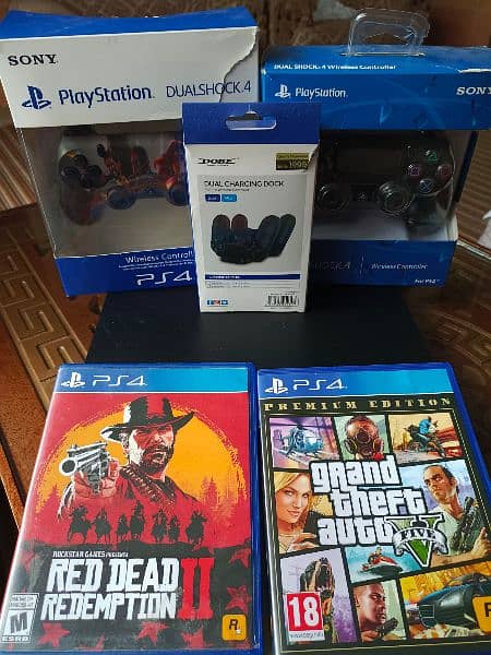 Ps 4 slim 500gb with two Controller and games 8