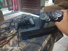 playstation 2 pro with 2 remote/ exchange possible with mobile