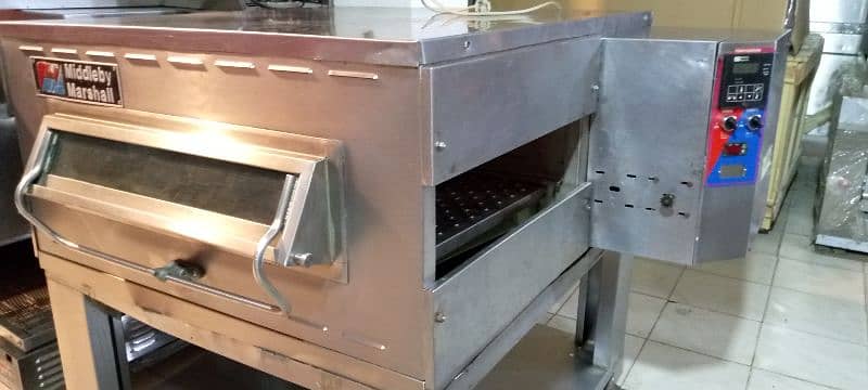 middle by marshall 22" belt// pizza oven// dough mixer// counters 2