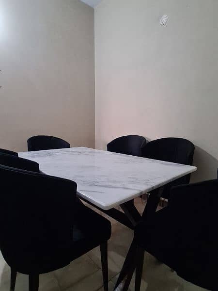 six seater white marble top, black velvet chair dining table 1