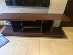 Used slightly damaged TV table