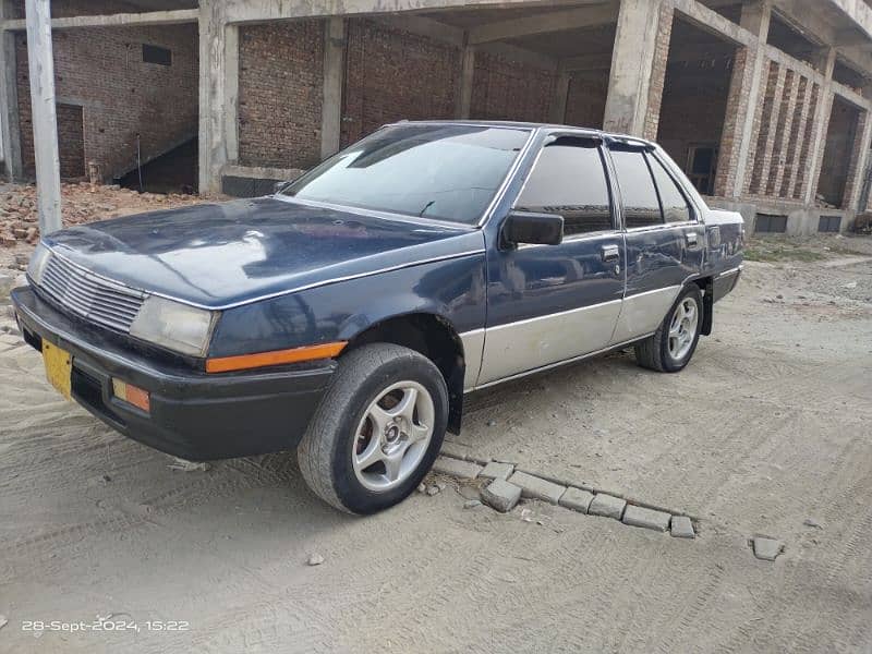 Mitsubishi Lancer 1986 03017278104 2