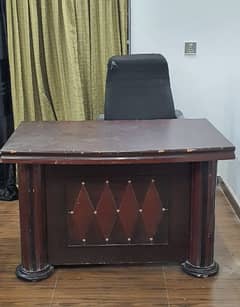 Office table with black revolving chair