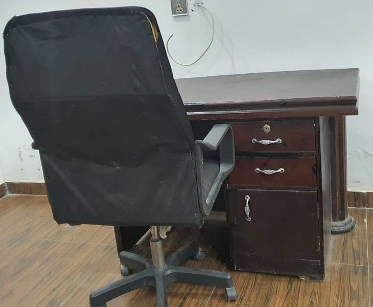 Office table with black revolving chair 1