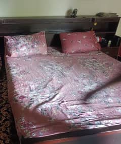 bed attached with side tables and with mattress