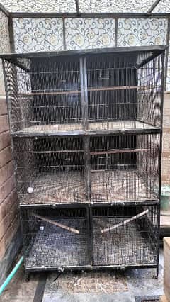 Big cage with small cage and boxes