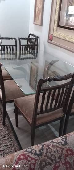 glass dinning table with 6 chairs for sale