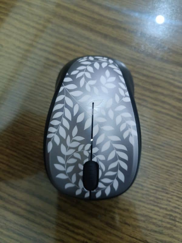 Logitech M317C Himalayan Fern Branded Invisible Optical Wireless Mouse 4