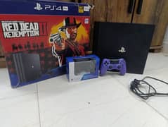 PS4 PRO with 2 controllers and box