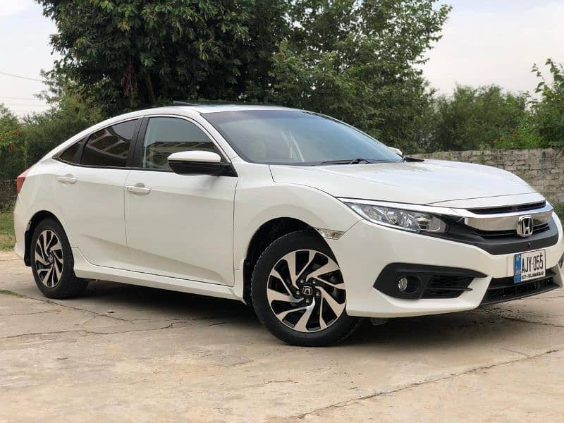 X Corolla Rent A Car Islamabad | Prado, V8, Revo, Car Rental Islamabad 16