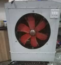 New air cooler, only 4 months used for sale rs. 8000.