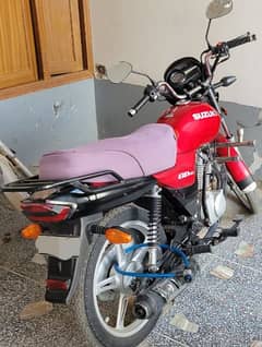 Suzuki 110, Red color.