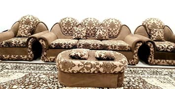 five seater sofa set with cushions and table