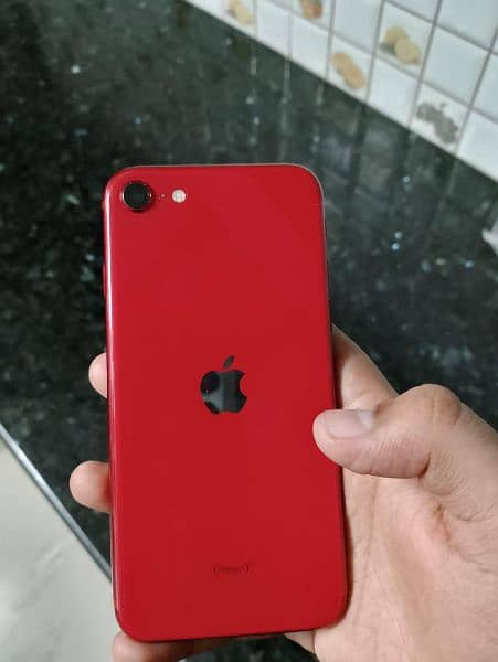 iphone SE red edition 64gb 10 10 condition true tune active 0