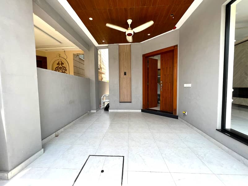 State-Of-The-Art 5 Marla House In DHA Phase 9 Town Block C Stunning 3 Beds, Modern Kitchen, Dining, TV Lounge, Smooth Deal With The Estate Business 3