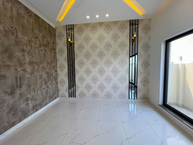 Luxurious 5-Marla Residence with 3 Bedrooms and Prime Location in DHA Phase 9-Town Block A 11