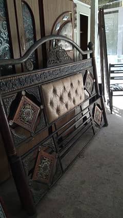 iron bed and almari