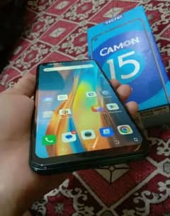 Tecno common 15 with box in orangi 1 no plz add details check kre 0