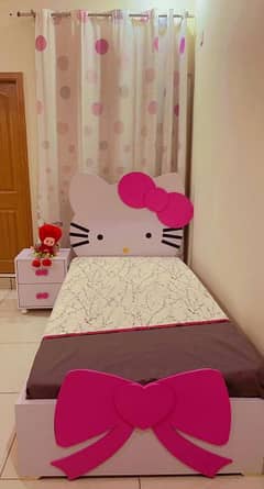 kids bed with side rack