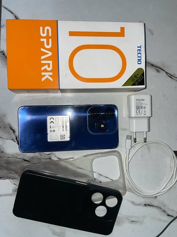 Tecno spark 10 new condition, 3 month warranty and all accessories 0