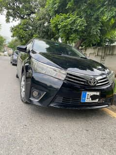 Toyota Corolla 2015 xli convert Gli Islamabad number