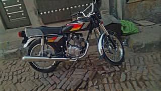 I am selling my honda 125 with lush condition