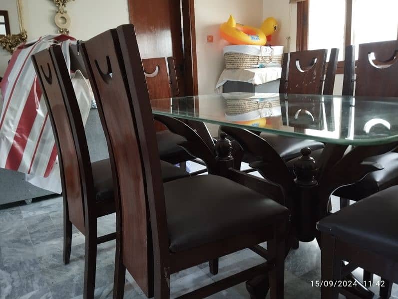 6 seater dinning with glass table top 1