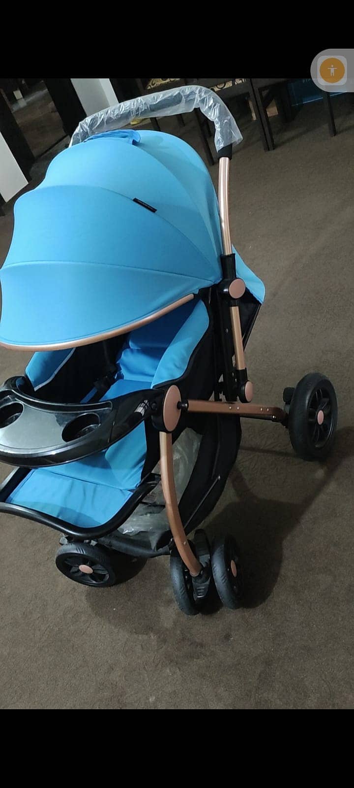 Two prams one in blue one in purple colour 1