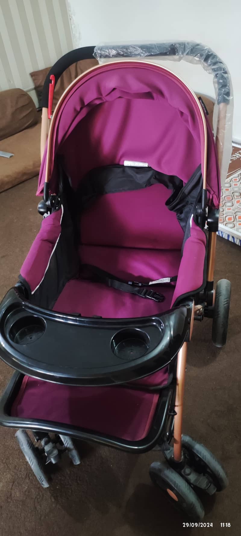 Two prams one in blue one in purple colour 3