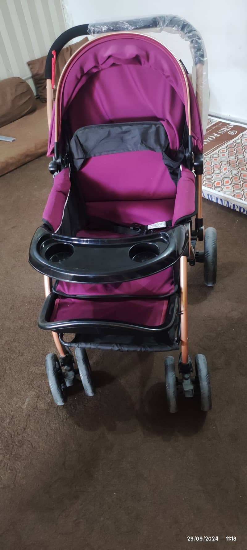 Two prams one in blue one in purple colour 5