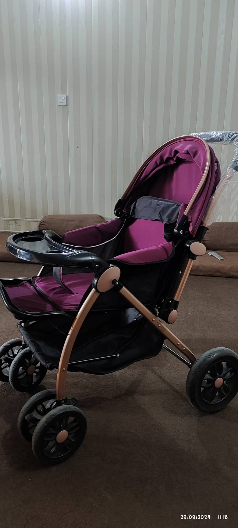 Two prams one in blue one in purple colour 6